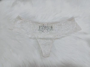 VICTORIA'S SECRET MEDIUM WHITE FLORAL LACE RARE CHEEKSTER THONG PANTIES - Picture 1 of 3