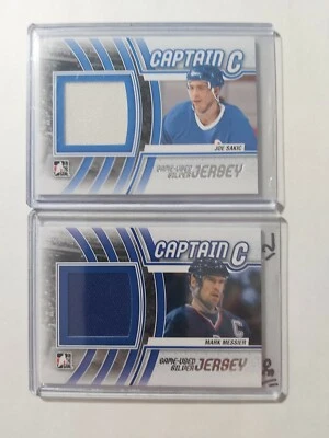 2011-12 ITG Captain-C Game Used Jersey Silver Joe Sakic & Mark Messier (2 Cards) - Image 1 of 4
