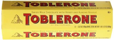 Toblerone Chocolate con Leche Suizo con Turrón de Miel y Almendras, 6 - 100g Barritas, T... Foto 1 de 4