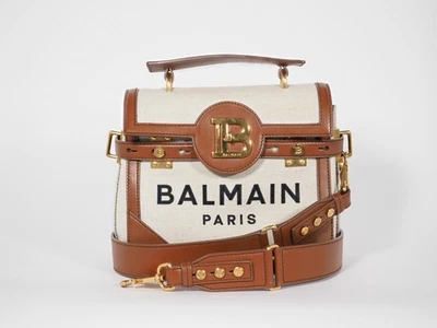 Cartera Balmain B-Buzz 23 de lona y cuero con herrajes dorados Foto 1 de 4