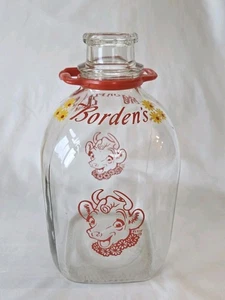 Jarra botella de leche de vidrio de un galón Borden’s Elsie Cow de colección con mango rojo de flores  - Imagen 1 de 7