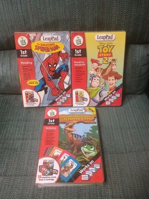 3 LeapFrog LeapPad Spider-Man Toy Story Dinosaurs Reading 1st Grade Cartridges - Image 1 of 4