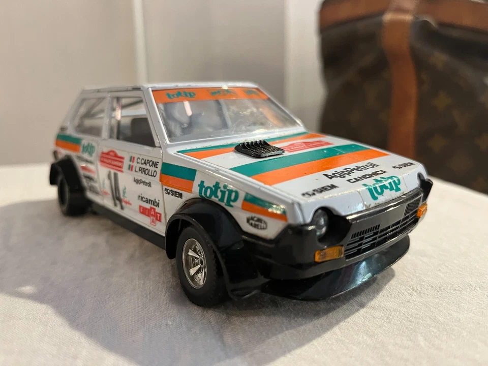 Fiat Ritmo Abarth Burago 1/24 25° RALLYE SANREMO 1983 TOTIP CAPONE PIROLLO rara - Immagine 1 di 4