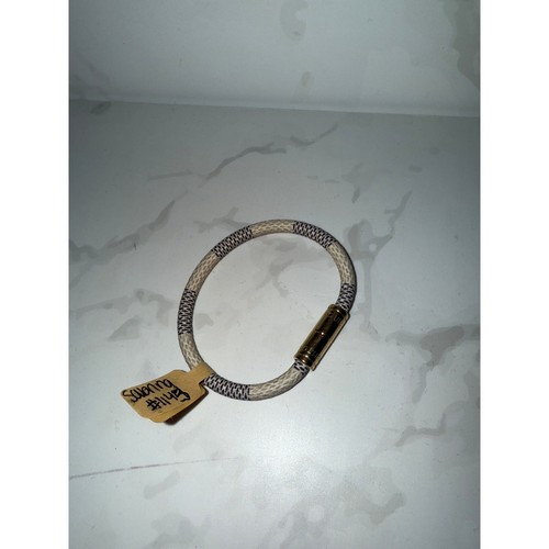 LOUIS VUITTON（LV） Bracciale LV in tessuto con chiusura in metallo