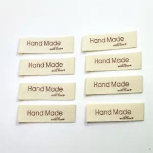100x Hecho a mano con amor Algodón Ropa Etiquetas Bolsos Jeans Etiquetas Hágalo usted mismo Costura Decoración - Imagen 1 de 6
