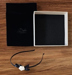 VINTAGE DOLCE & GABBANA. BLACK SATIN AND CREAM PORCELAIN CAMILLA FLOWER HEADBAND - Picture 1 of 5
