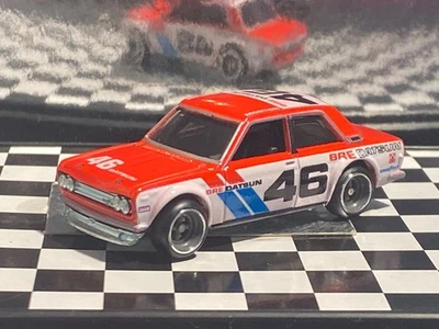 1/64 1971 Datsun Bluebird 510 #46 Morton Bre Datsun rojo y blanco neumáticos de goma M28 Foto 1 de 4