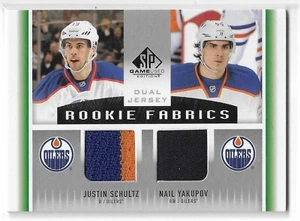 2013-14 SP GAME USED JUSTIN SCHULTZ NAIL YAKUPOV ROOKIE FABRICS #RF2-SY OILERS - Picture 1 of 2