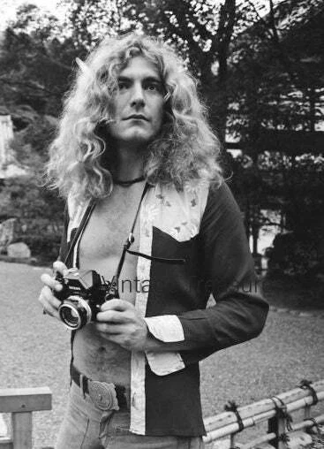 Led Zeppelin Singer Robert Plant Holding a Nikon in Japan Photo Print Poster - Image 1 of 1
