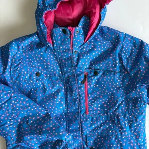 Giacca da neve bambino Arctix cappotto invernale blu rosa stampa stelle cappuccio imbottito isolato - Foto 1 di 12