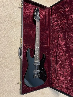 Guitarra Eléctrica Ibanez RG7421 7 Cuerdas Negra con Estuche Ibanez Universe ACTUALIZACIONES Foto 1 de 4