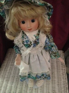 Vintage Porcelain Doll in Blue Green Flowery Dress - Picture 1 of 3