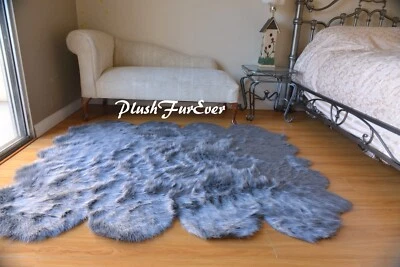 Alfombra infantil de piel de oveja gris Octo 5' x 6' Foto 1 de 4