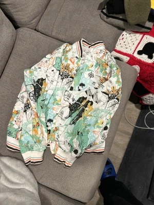 Chaqueta de colección Artful Dodger para hombre con estampado completo, reversible Foto 1 de 4