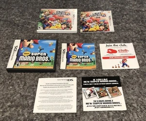 (2) New Super Mario Bros. & Super Smash Bros. DS CASE, ARTWORK & MANUAL ONLY LOT - Picture 1 of 4