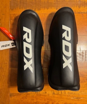 RDX SGR T1 MMA Espinilla Interior Gigante Instep Protectores Negro TALLA 170-188 cm Muay Thai Foto 1 de 3