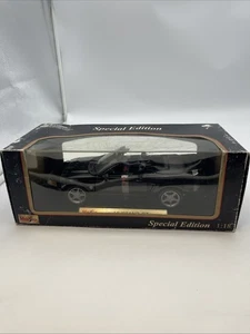 Ford Mustang GT Cabrio Maisto 1:18 1999 pressofuso - nero - Foto 1 di 15