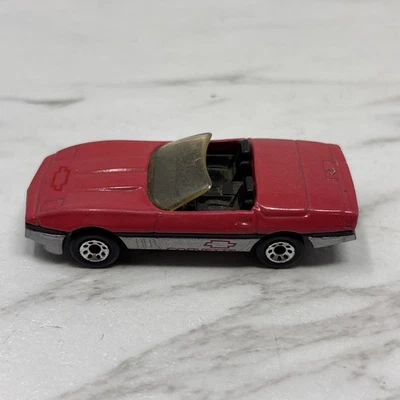 Matchbox 1983 / 1987 Corvette Red w/ Silver Macau - Image 1 of 4
