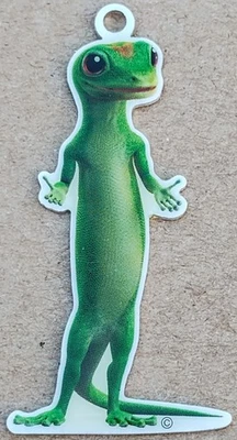 Geico Gecko Promotional Tag Geocoin - Activated & Adoptable - TB4GG0X - Image 1 of 2