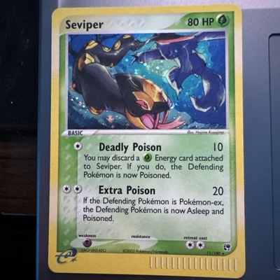 Seviper Sandstorm Holo Card 11/100 Holo Swirl Rare Mint - Image 1 of 4