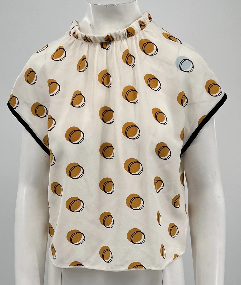 Blusa Fendi blanca manga corta con patrón de lunares negros y amarillos talla 40 Foto 1 de 4