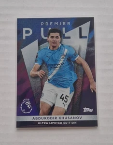 Abdukodir Khusanov PREMIER PULL Card PP11 Topps Premier League 2026 1:100 Packs - Bild 1 von 2