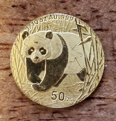 China Gold Panda 2002 1/10 oz 50 yuanes 50 años -- fecha clave rara, ver descripción.  Foto 1 de 4