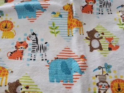 Joann Telas Super Acurrucadas Algodón Franela Multicolor Animales de Zoo 42"W X 35"L Foto 1 de 4