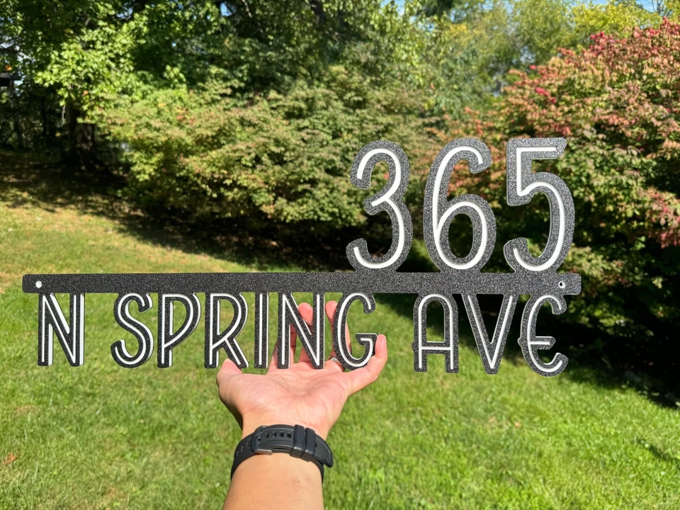 Placa de dirección flotante con letrero de números de casa moderna Foto 1 de 4