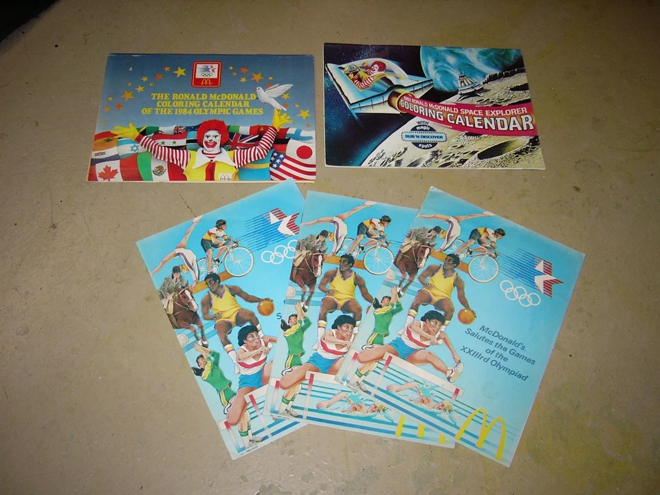 1984 McDonalds Olympic Games Programs Olympiad Collectible 3) and 2 calenders - Image 1 of 1