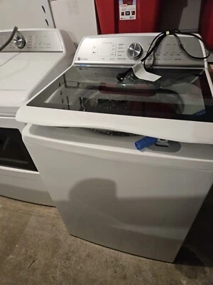 GE Profile Smart 5 cu. ft. Top-Load Washer/7.4 cu. ft. Front-Load Dryer Pair - Image 1 of 4