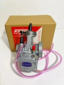 Honda CR125R 1985 OEM KEIHIN PJ 34 CARBURADOR CUERPO DEL ACELERADOR 16100-KA3-305 - Imagen 1 de 4