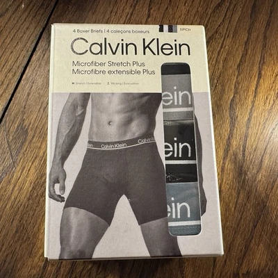 Calzoncillos boxer Calvin Klein elásticos de microfibra para hombre talla mediana paquete de 4 gris/azul Foto 1 de 3