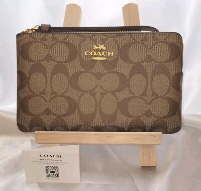 Muñequera de lona Coach nueva con etiquetas grande cremallera en esquina caqui/silla de montar 2 ranuras CC  Foto 1 de 4