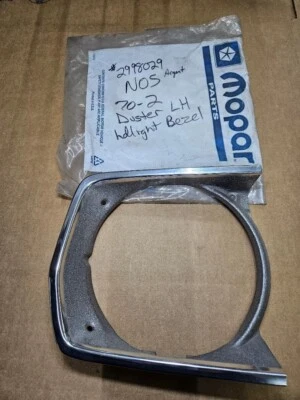 MOPAR NOS 2998029 1970 PLYMOUTH DUSTER LEFT HEADLIGHT BEZEL - ARGENT - Image 1 of 4