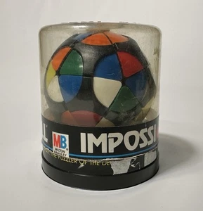 Vintage 1982 Milton Bradley MB Impossi-Ball Puzzle Spiel Rubik’s Cube mit Hülle - Bild 1 von 4