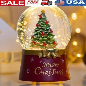 Musikalische Schneekugel beleuchtet Weihnachtsdeko mit Timer glitzernde Wasserszene - Bild 1 von 7