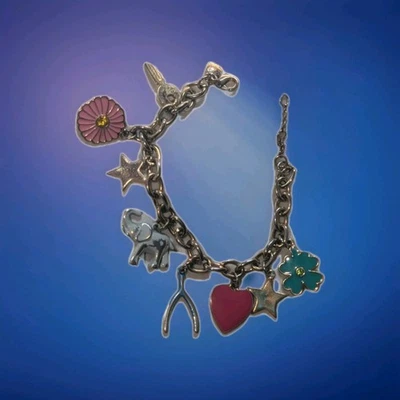 Pulsera J.Crew Charm Elefante Corazón Estrella Flor Wishbone Rosa Esmalte Usado Foto 1 de 2