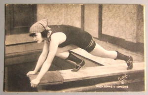 C. 1915, Mack Sennett Studios, Marie Prevost, Mabel Normand, on a diving board - Picture 1 of 4