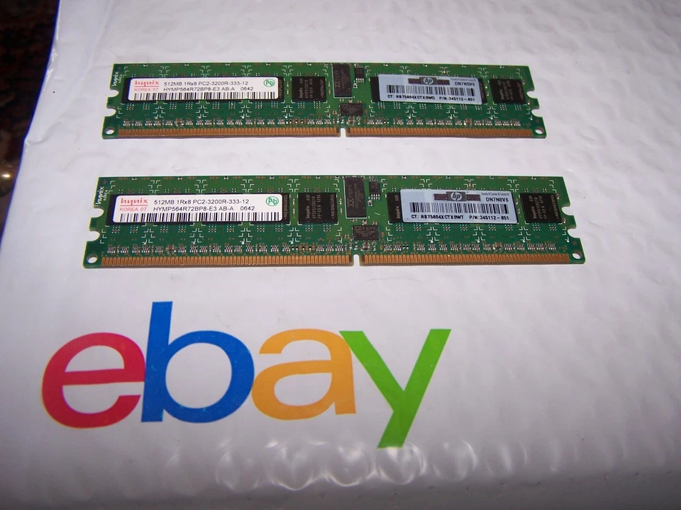 Pair of hynix 512MB 1RX8 PC2-3200R-333-12 RAM HP P/N 345112-851 - Image 1 of 1