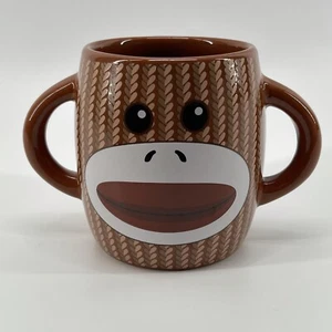 Taza de café Galerie 'Sock Monkey' doble mango marrón a rayas 14 oz - Imagen 1 de 5