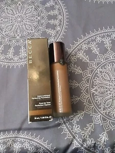 1oz BECCA Aqua Luminous Perfecting Foundation, Dark Golden NIB (box has wear) - Picture 1 of 2
