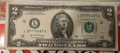 circulated $2 Bill with Rare 777 # Serial L37775497A  - Image 1 of 2