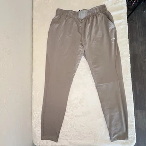 Pantalones Gymshark Para Hombres Grandes Grises Ligeros Atléticos Cónicos Bolsillos con Cremallera Gimnasio - Imagen 1 de 12