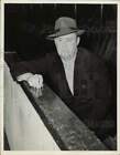 1948 Press Photo Bill Cook of Cleveland Barons looks pensive at the stadium