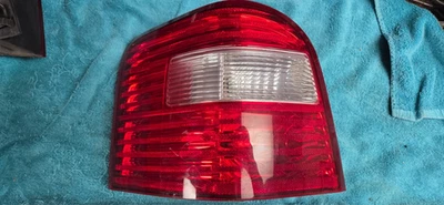 Conjunto de luz trasera lateral izquierda Ford Freestyle 2005-2007 OEM 6F9Z13405AA Foto 1 de 2