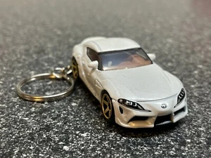 2023 Toyota Supra GR Keychain White Hot Wheels Matchbox - Picture 1 of 4