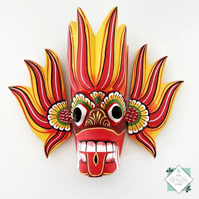 Hand Crafted Wooden Red and Yellow Mask Wall Decor Ceylon Gini Raksha - Image 1 of 4