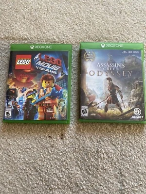Xbox One New Assassin’s Creed Odyssey & Used The LEGO Movie Video Game Lot - Image 1 of 4