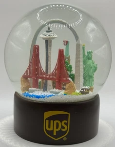 United Parcel Service UPS Schneekugel - Szenen kultiger Wahrzeichen 2017 - Hand Shak - Bild 1 von 7